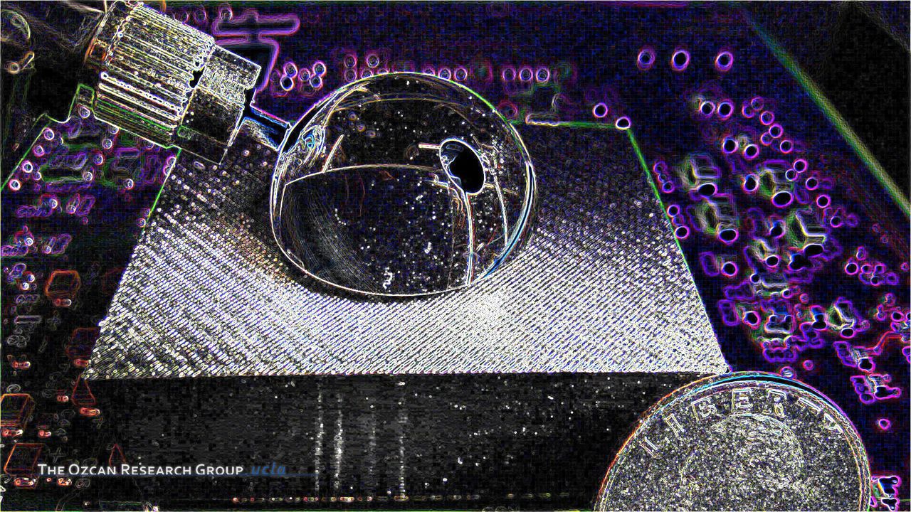 Wide-field Lensless Fluorescent Microscopy Using a Tapered Fiber-optic Faceplate On a Chip